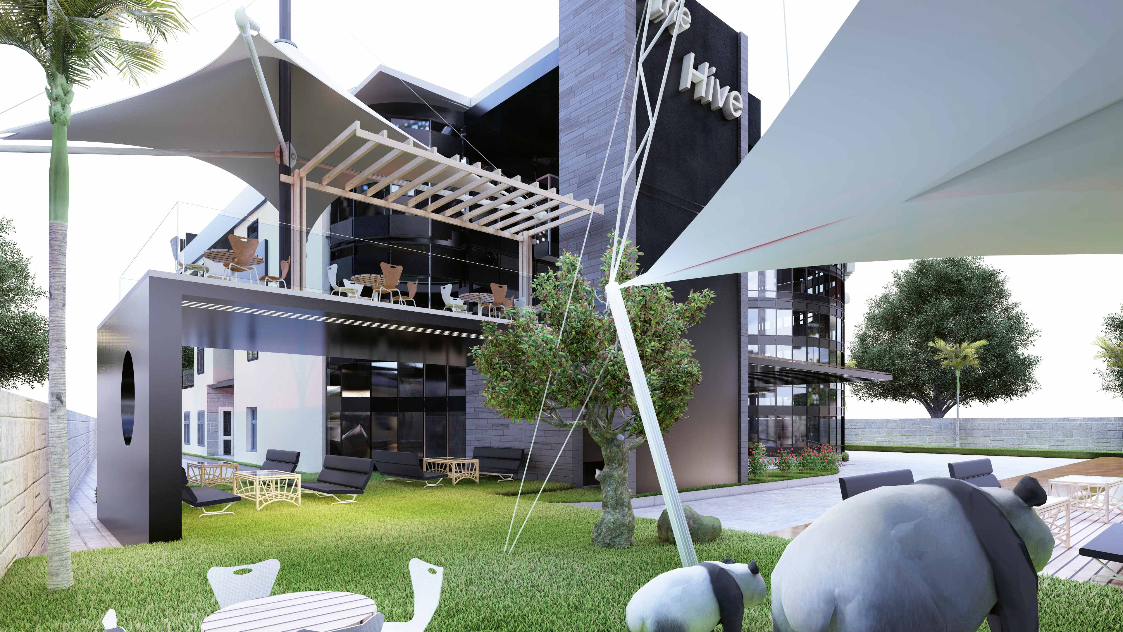 The Sunny Side Eco Hub garden and terrace, with lush landscaping and shaded outdoor lounges